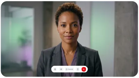 The video avatar experience in PersonaTrain.ai showing a photoreal AI character mid-conversation with live captions and call controls